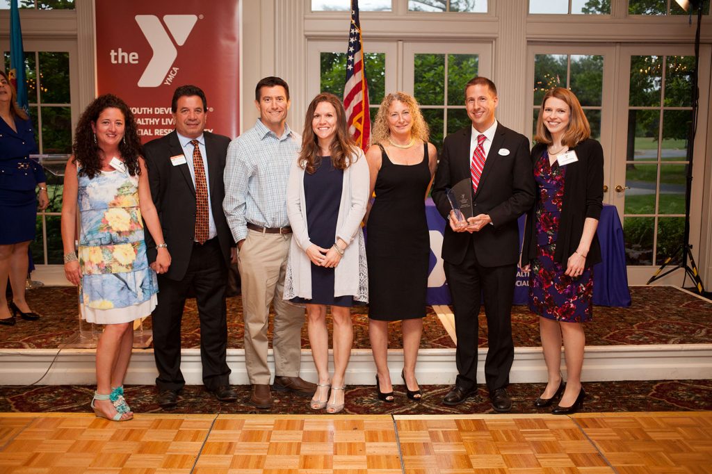 The Middletown Family YMCA staff and their spouses happily accepted the Community Builder Award.