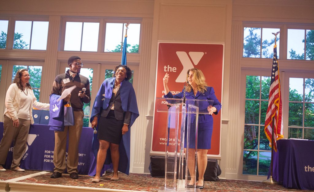 Miles Evans and Kerri Edwards were presented with scholarships for books and other school supplies.