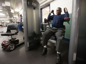 Man Using Gym Equipment