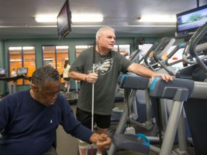 Two Men in Fitness Room
